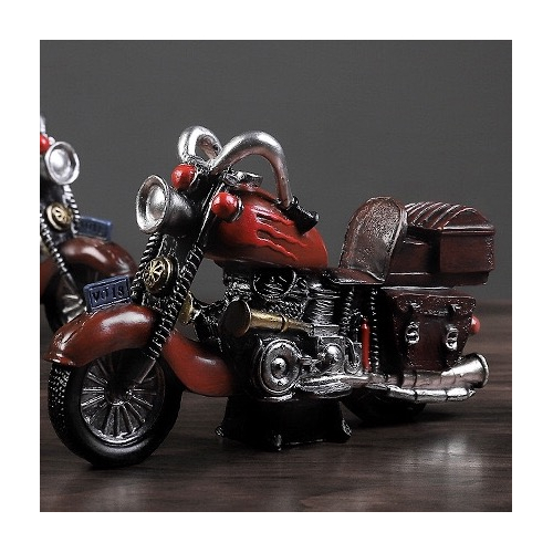 Motocicleta retro statuie